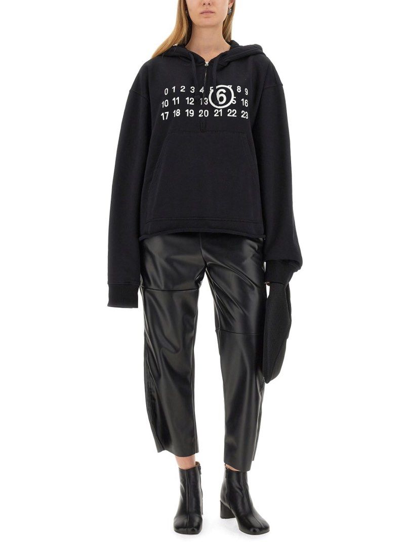 Maison Margiela MM6 Zip Black Hoodie (Medium) (Category: Luxury Apparel) located in Cavite. Submitted by frommetoyouthings (Listing ID 1338354821, Image 3). Description: Excellent like new condition Unisex For men: fits small to medium size For women: fits small to large size Female model is 175cm tall and wears SMALL Male model is 187cm tall and wears MEDIUM.