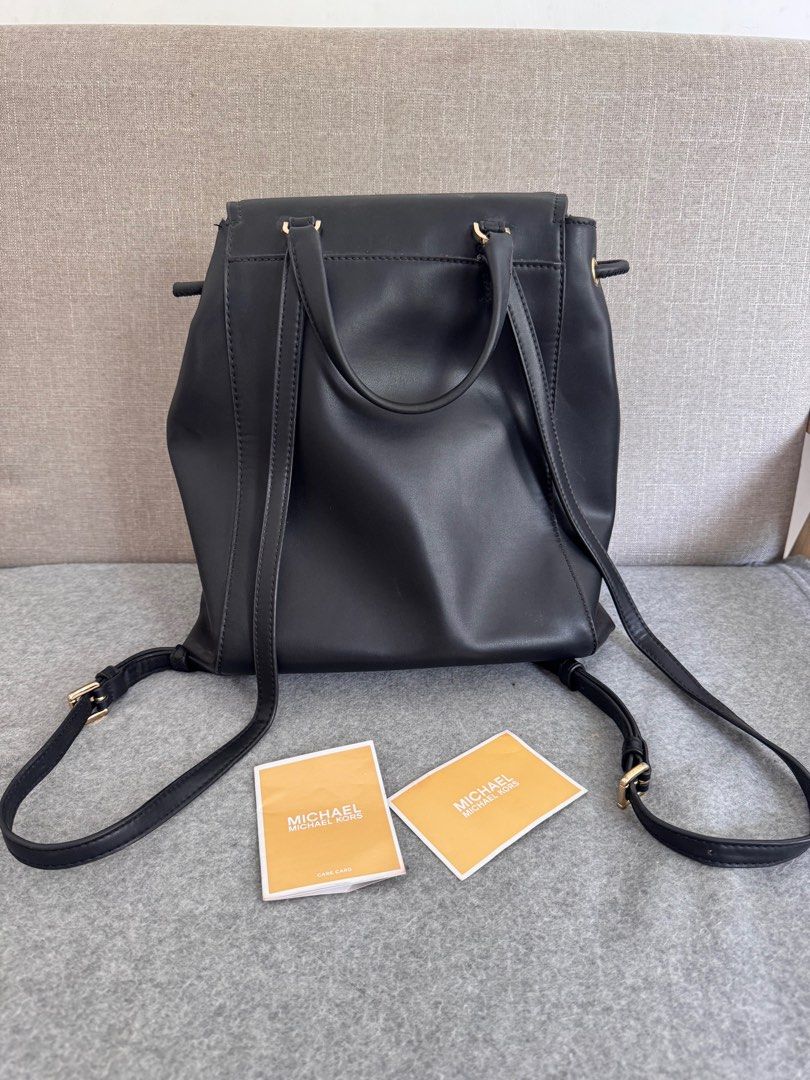 Michael Kors Backpack leather (Category: Luxury Bags & Wallets) located in Caloocan City. Submitted by jelshandeclutters (Listing ID 1390649894, Image 3). Description: - AUTHENTIC (bought from US Pasabuy for Php 7,500 would show screenshots just pm) - Can fit my Ipad Air 3 & spacious - Issues posted (but not noticeable since they're hidden) - Leather is still in pristine condition -Manage your expectation since the bag is preloved .