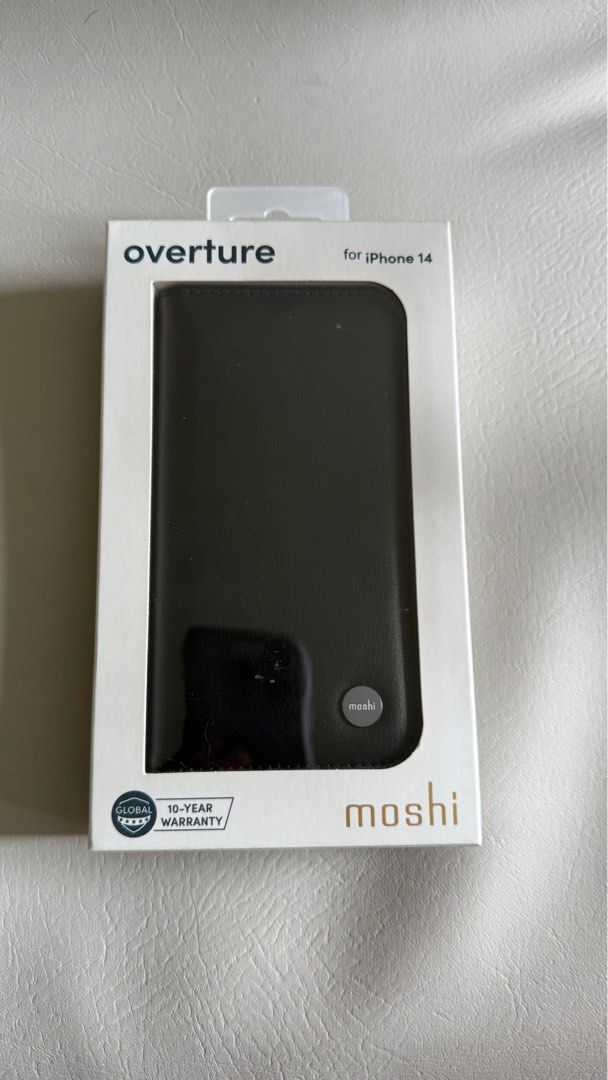 Moshi Japanese Brand Leather Iphone Case (Category: Cases & Sleeves) located in Pasig City. Submitted by jpecc (Listing ID 1390622427, Image 1). Description: Unused/Brand New Moshi Leather Iphone 14 case in black color.
