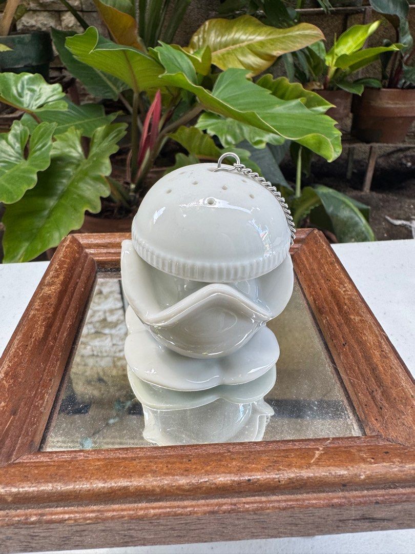 One piece porcelain tea ball (Category: Coffee & Tea Tableware) located in Davao. Submitted by parteawares2 (Listing ID 1390630363, Image 1). Description: One piece porcelain tea infuser .