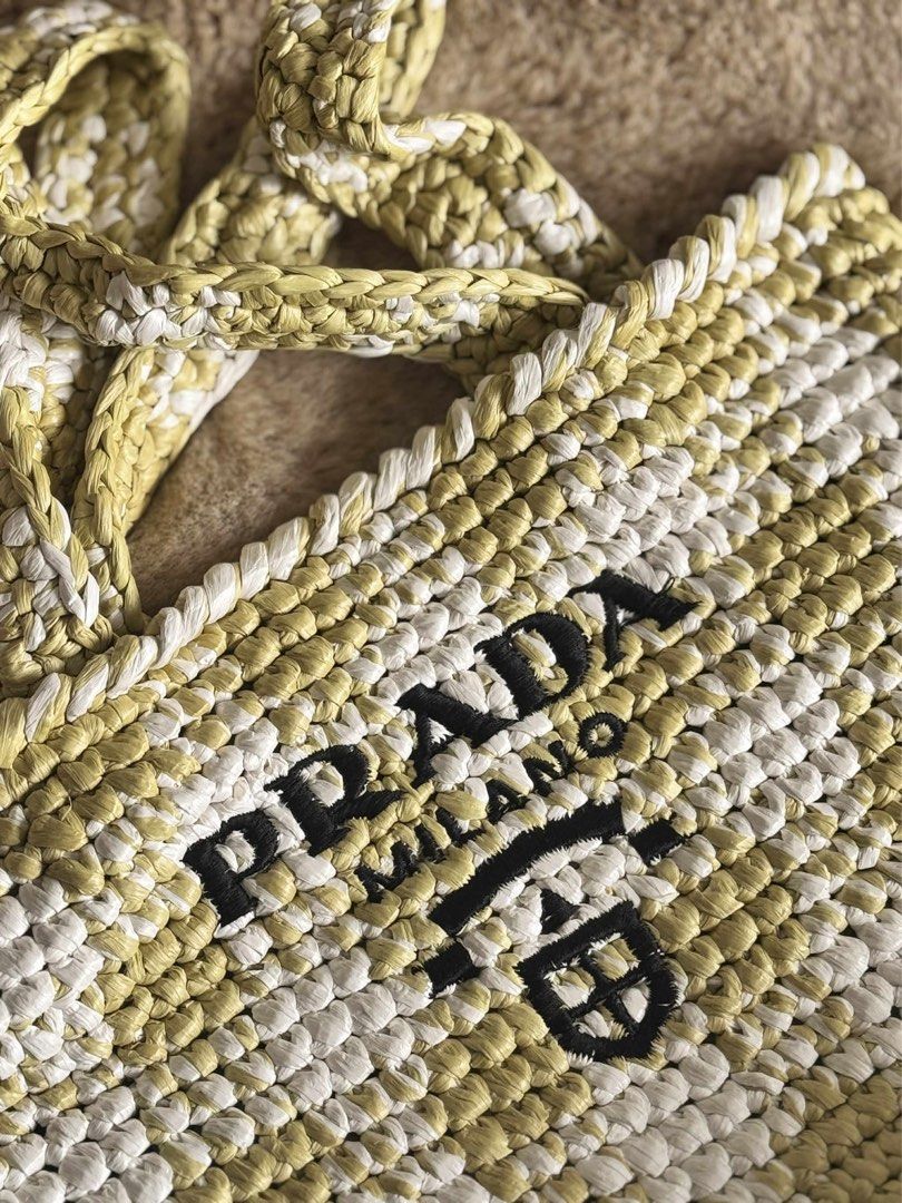 Prada Raffia Tote – Small (Yellow/White) (Category: Luxury Bags & Wallets) located in Cavite. Submitted by kumbin (Listing ID 1390692847, Image 3). Description: 🌿 Prada Raffia Tote – Small (Yellow/White) Lightweight woven summer bag, chic and easy to carry. 🖤 Authentic Prada raffia tote 🖤 Well-used condition, priced accordingly 🖤 No interior tags/lining (see photos) 🖤 Still stylish & functional for casual or beach use 💰 Should be ₱10,000 on