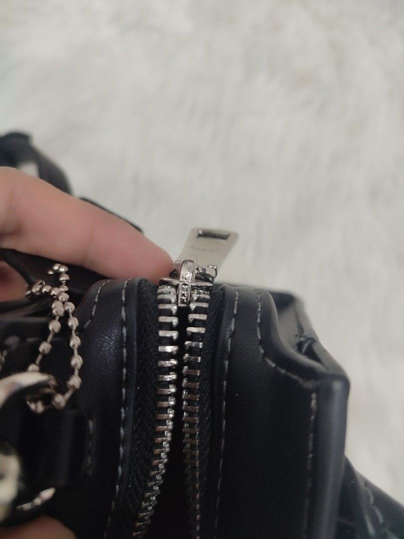 Preloved Authentic Coach Mini Andrea Sling Bag (Category: Luxury Bags & Wallets) located in Bulacan. Submitted by mandjays (Listing ID 1390734720, Image 3). Description: Almost new condition. Please check all pictures posted. Strictly no returning of item. Negotiable!.
