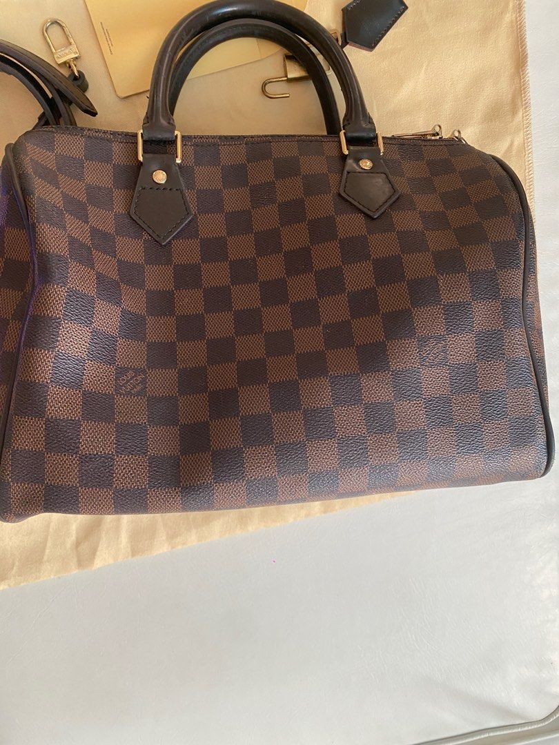 Preloved Speedy (Category: Luxury Bags & Wallets) located in Cavite. Submitted by jyesebel (Listing ID 1390605309, Image 3). Description: Hello There! I'm selling my preloved Speedy 30 (Mirror copy) Bought in greenhills for P4k I'm selling it now for ₱1,500 only plus shipping (location: Unitop, Dasmariñas, Cavite) Complete with dust bag, lock and key, carecard and sling (with code sya) Pantay ang positioning ng mga logo See photos to appreciate. 