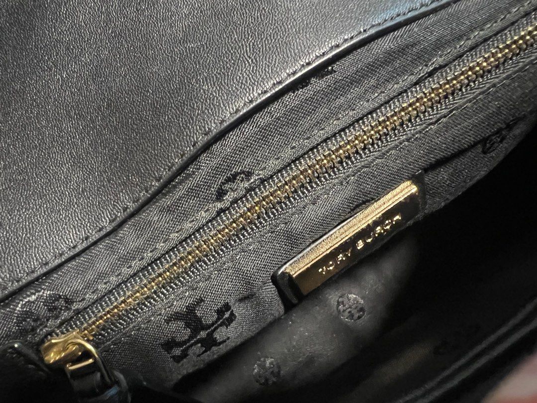 Tory Burch Fleming Bag Lambskin (Category: Luxury Bags & Wallets) located in Manila. Submitted by joycevchua (Listing ID 1390687866, Image 2). Description: Authentic Tory Burch Fleming Bag - First Owner - slight damaged at the back but still useable - RFS: Decluttering with dust bag.