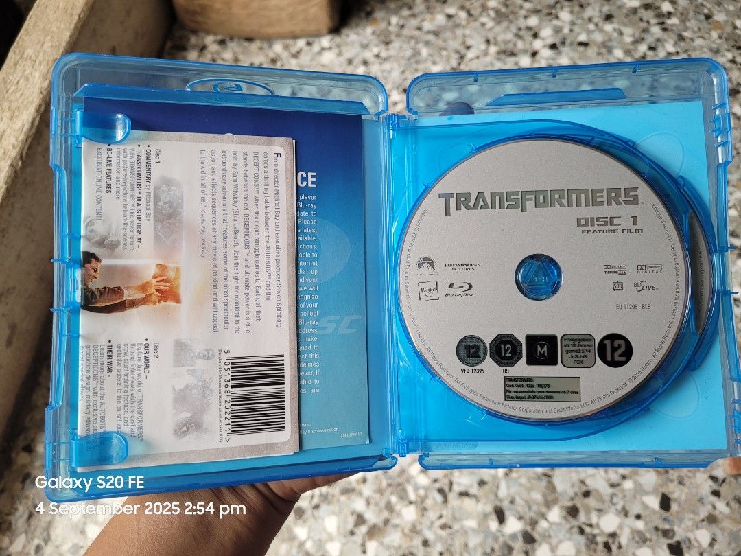 Transformers (Two-Disc Special Edition) Blu-ray (Category: Blu-Ray & Media Players) located in Cotabato. Submitted by choonching (Listing ID 1390682204, Image 3). Description: 📀 Brand new condition, never used! ✅ Two-disc special edition – sulit for collectors and fans! 💿 UK release (12 rating logo). ⚠️ Note: The only issue can be seen sa last pic (case lang, hindi discs – unused pa talaga). Perfect for Transformers fans na gusto ng legit physi