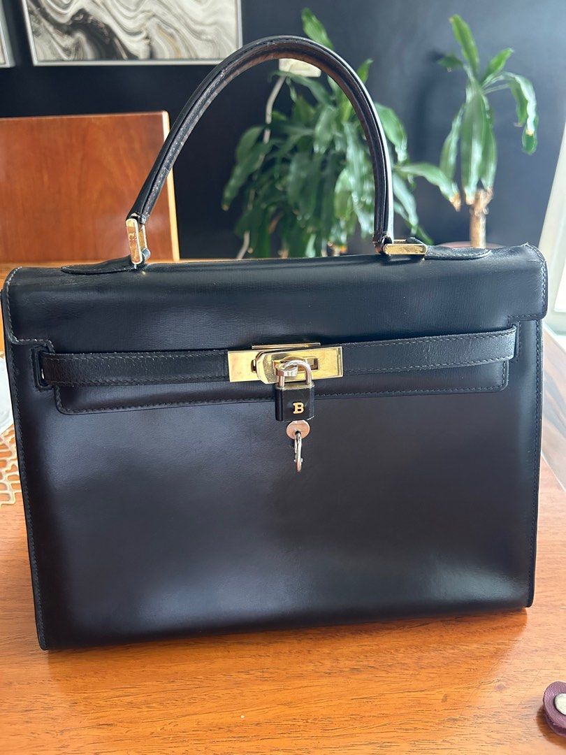 Vintage Bally Kelly 32 Box leather (Category: Luxury Bags & Wallets) located in Taguig. Submitted by vintage_gifted_thrifted (Listing ID 1388206932, Image 2). Description: Vintage Authentic Bally Made in Switzerland Kelly-style handbag in shiny box leather.This did not come with a strap. Comes with dustbag.This is a vintage item. Pls manage expectations..