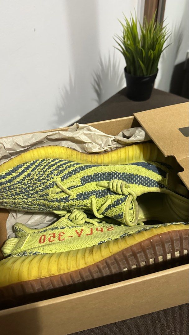 Yeezy 350 Frozen Yellow (Category: Casual Shoes) located in Manila. Submitted by ivan24dizon (Listing ID 1390743503, Image 1). Description: Yeezy 350 Frozen Yellow Sz 10 US USED needs cleaning .