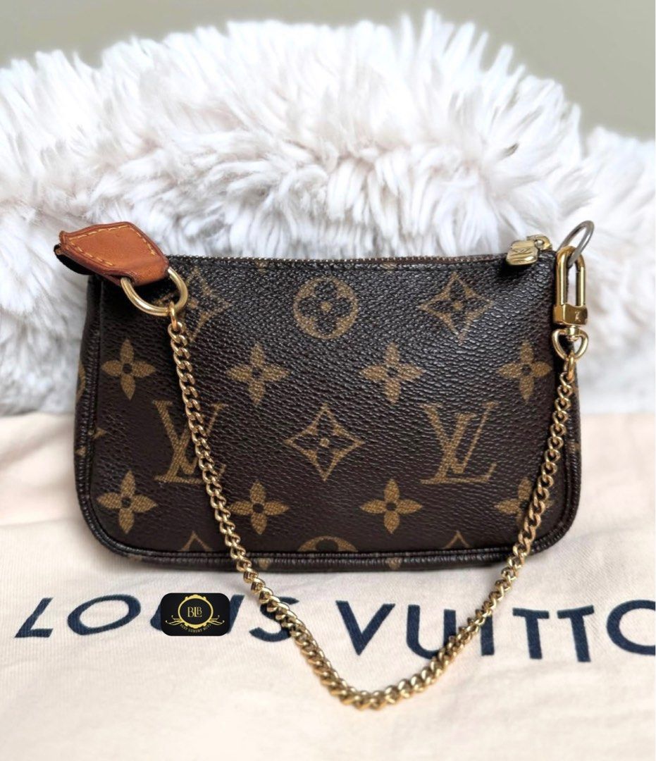 Authentic Louis Vuitton Lv Mini Pochette Hobo Bag (Category: Luxury Bags & Wallets) located in Pasig City. Submitted by bestluxurybuys (Listing ID 1390871865, Image 2). Description: Authentic Louis Vuitton Lv Mini Pochette Hobo Bag Dm or Vber O92755II747.