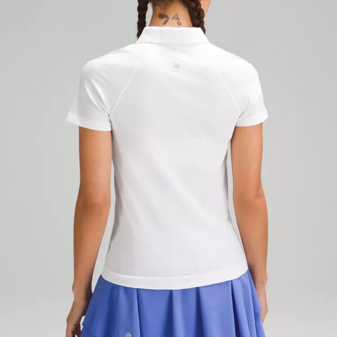 authentic lululemon swiftly tech short sleeve half-zip polo white tee shirt top zip golf tennis sports alo nike adidas cute basic ladies women girls (Category: Shirts) located in Singapore. Submitted by bbgbubz (Listing ID 1390800601, Image 3). Description: authentic tagged size 8 no flaws cheapest on carousell 🩵 deadstock item at lululemon, in a cute basic white color so easy to pair w anyth!! has classic lululemon logo at the back, breathable 
