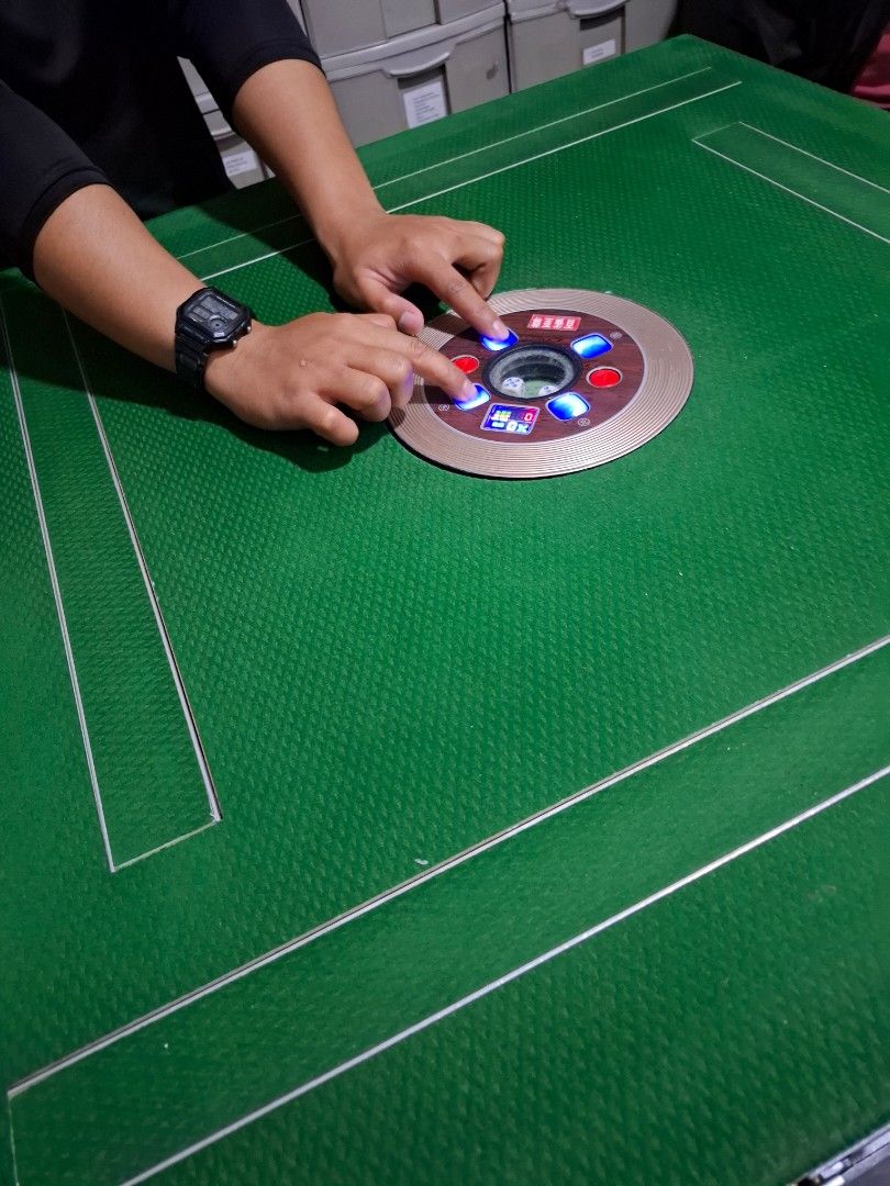Automatic mahjong table (Category: Board Games & Puzzles) located in Caloocan City. Submitted by aicadc (Listing ID 1390836201, Image 3). Description: 🎉 Level up your game nights! 🎉 Get your Brand New Electronic Mahjong Table Set with FREE brush & cover for only ₱27,000! ✅ Automatic table + 288 tiles ✅ Complete set with dice & coins ✅ Good for 4 players 📍 Banawe, Quezon City 🛠 We also do repairs! 📩 Send us a message now!.