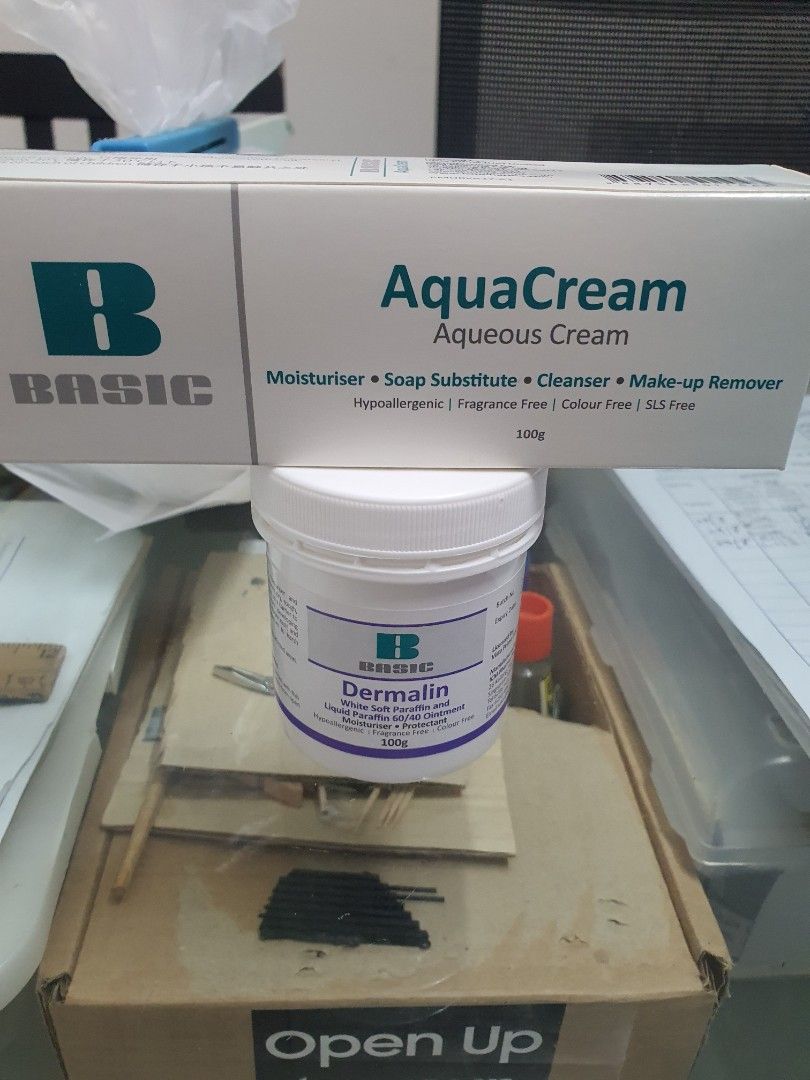Basic AquaCream & Dermalin Paraffin (Category: Body Care) located in Singapore. Submitted by toufu69 (Listing ID 1390868310, Image 1). Description: - AquaCream: Moisturizer, soap substitute, cleanser, and makeup remover. - Dermalin soft paraffin for softening hard skin - Both products are new and unopened. - Expiry dates are visible in the photos. - Bundle fixed price $10 if collect at Pasir Ris mrt. Discount $5 if collect at S510221 - Please ref