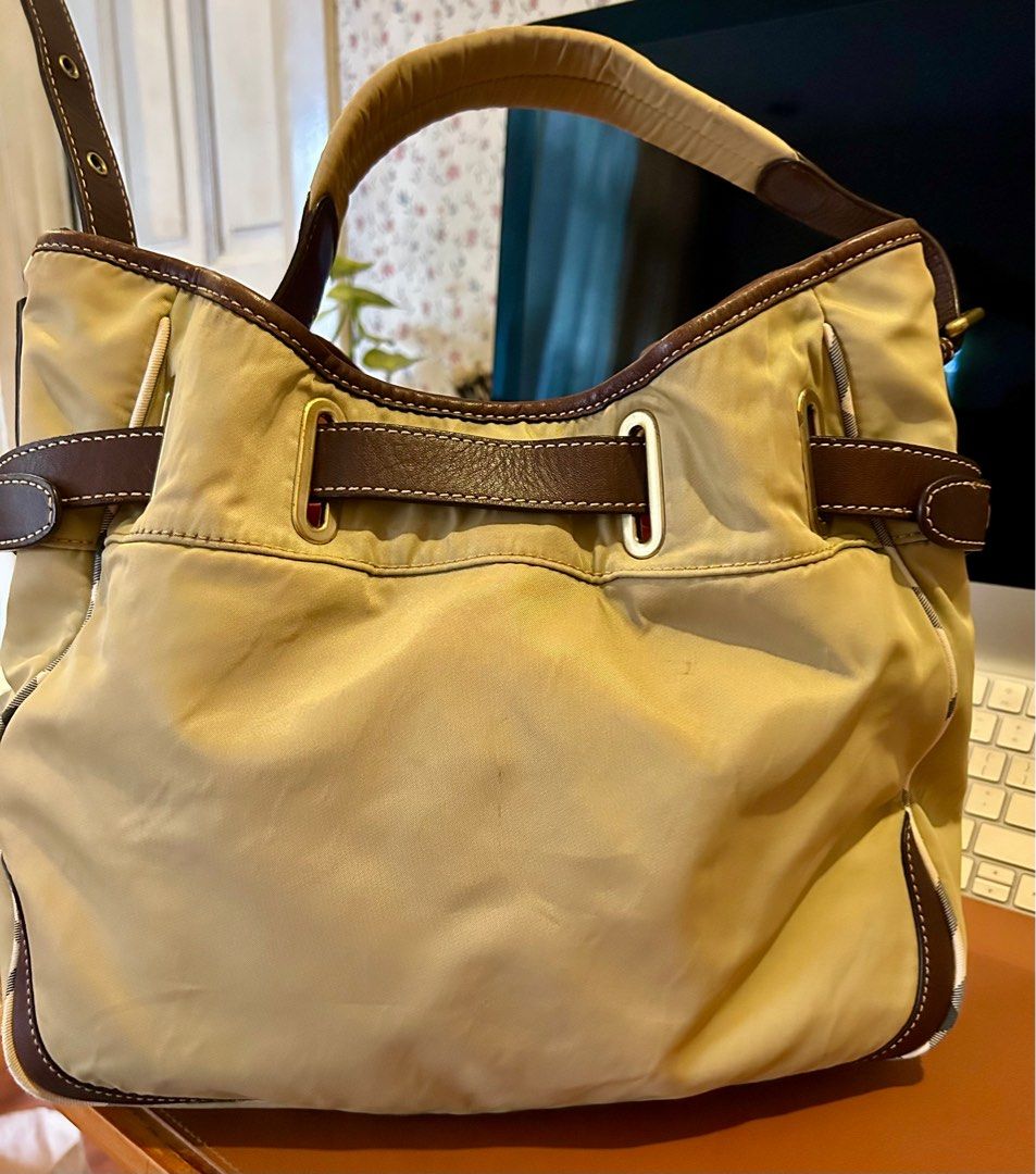 Burberry bucket/shoulder bag (Category: Luxury Bags & Wallets) located in Quezon City. Submitted by asiaco (Listing ID 1349459463, Image 3). Description: Very nice BB bucket bag. Spacious and clean. Adjustable side belts, nylon and leather combination, interior is cotton with signature bb plaid. Bucket bags are lucky money holders. This one is a blue label. .