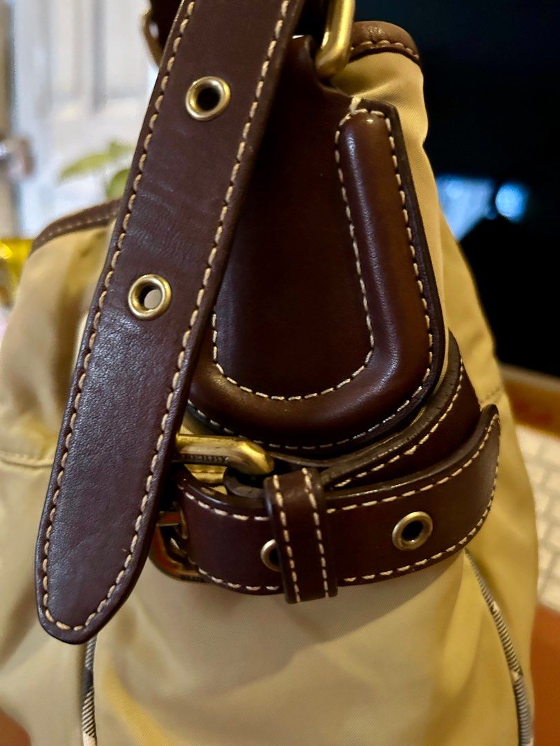 Burberry bucket/shoulder bag (Category: Luxury Bags & Wallets) located in Quezon City. Submitted by asiaco (Listing ID 1349459463, Image 2). Description: Very nice BB bucket bag. Spacious and clean. Adjustable side belts, nylon and leather combination, interior is cotton with signature bb plaid. Bucket bags are lucky money holders. This one is a blue label. .