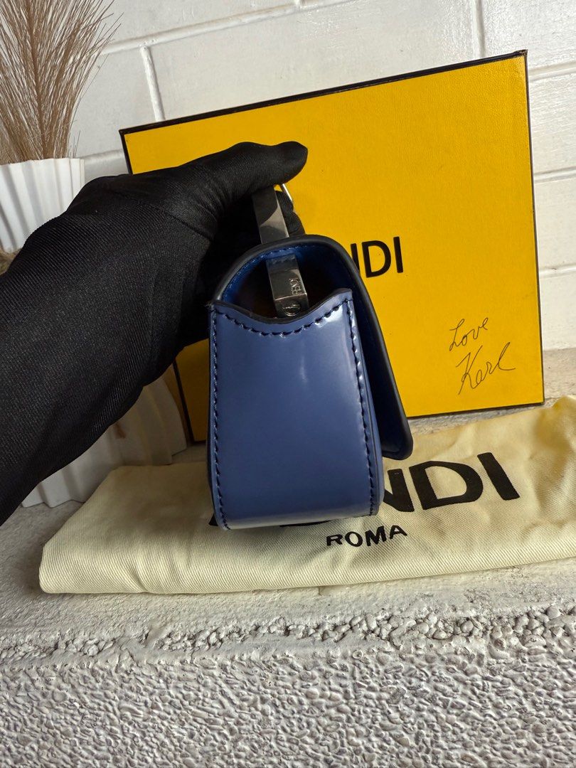 FENDI Nano Clutch Bag (Category: Luxury Bags & Wallets) located in Baguio. Submitted by drein30 (Listing ID 1390922787, Image 3). Description: Inclusion:dustbag Condition:9/10 Disclaimer! Daniel Rein Galgala is not affiliated to any of the brands posted. This luxury bag is being sold as-is. The authenticity and condition of the item have been assessed to the best of my ability, but I encourage interested buyers to inspect all provided photos and 