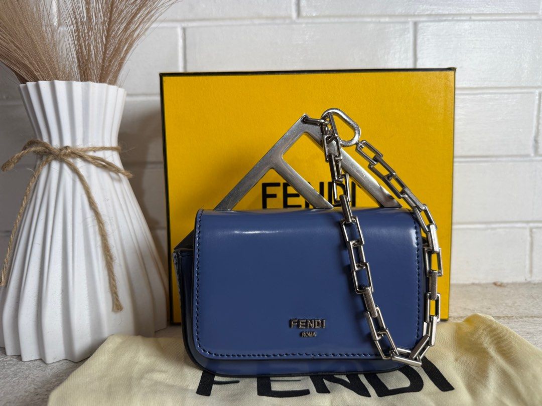FENDI Nano Clutch Bag (Category: Luxury Bags & Wallets) located in Baguio. Submitted by drein30 (Listing ID 1390922787, Image 1). Description: Inclusion:dustbag Condition:9/10 Disclaimer! Daniel Rein Galgala is not affiliated to any of the brands posted. This luxury bag is being sold as-is. The authenticity and condition of the item have been assessed to the best of my ability, but I encourage interested buyers to inspect all provided photos and 