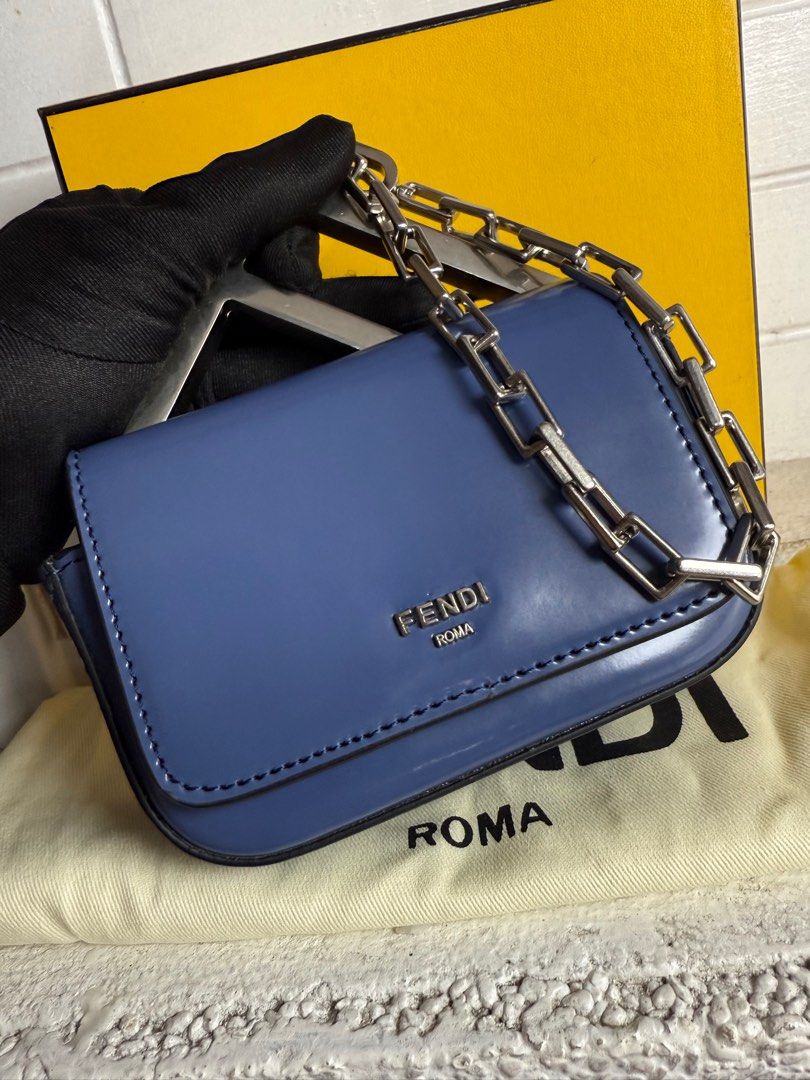 FENDI Nano Clutch Bag (Category: Luxury Bags & Wallets) located in Baguio. Submitted by drein30 (Listing ID 1390922787, Image 2). Description: Inclusion:dustbag Condition:9/10 Disclaimer! Daniel Rein Galgala is not affiliated to any of the brands posted. This luxury bag is being sold as-is. The authenticity and condition of the item have been assessed to the best of my ability, but I encourage interested buyers to inspect all provided photos and 