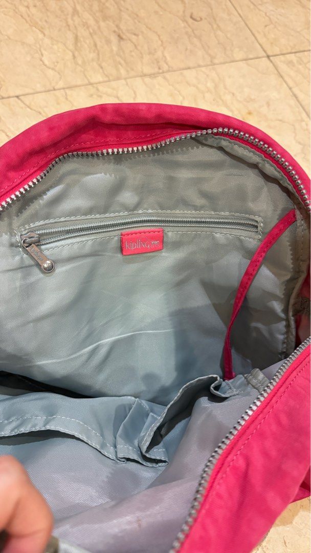 Kipling backpack (Category: Backpacks) located in Ipoh. Submitted by michellchl (Listing ID 1390795537, Image 2). Description: Lightly use , good condition, can be school bag, many compartments .