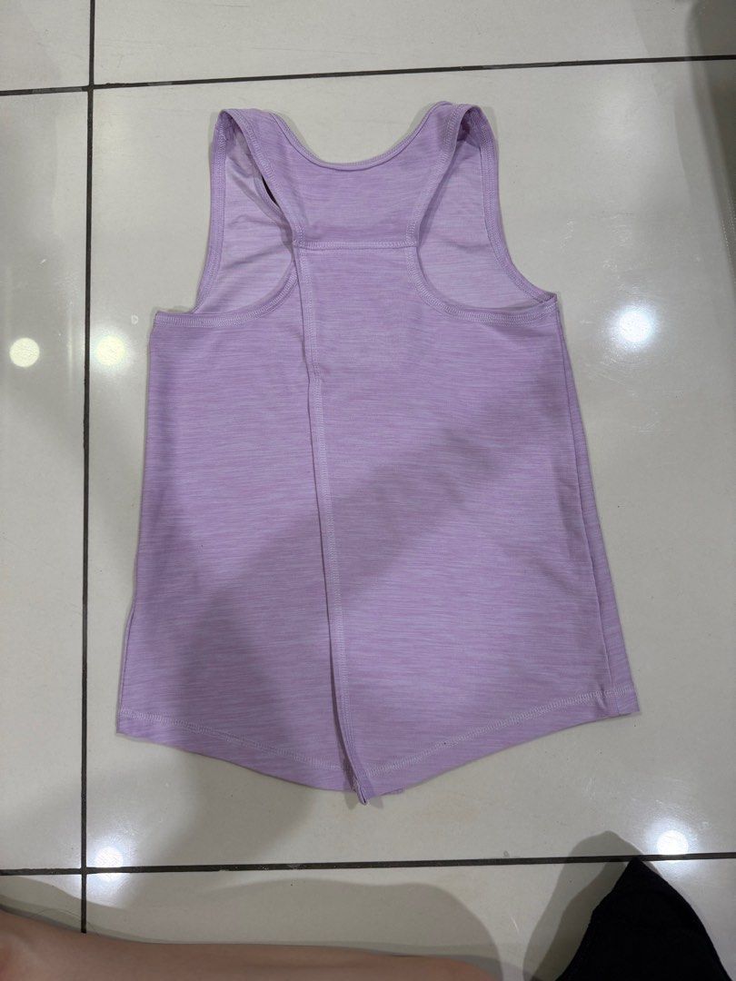 Purple split back active top (Category: Babies & Kids Fashion) located in Puchong. Submitted by drsyp (Listing ID 1390907495, Image 2). Description: 8 yo. Thick and quality material. Bought from New Zealand..