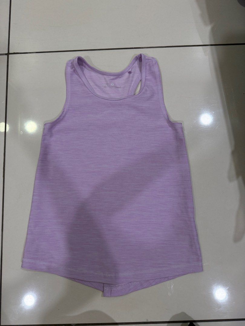 Purple split back active top (Category: Babies & Kids Fashion) located in Puchong. Submitted by drsyp (Listing ID 1390907495, Image 1). Description: 8 yo. Thick and quality material. Bought from New Zealand..