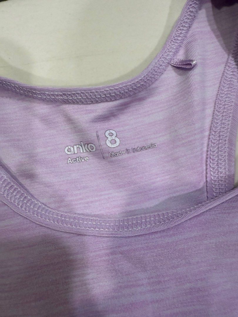 Purple split back active top (Category: Babies & Kids Fashion) located in Puchong. Submitted by drsyp (Listing ID 1390907495, Image 3). Description: 8 yo. Thick and quality material. Bought from New Zealand..