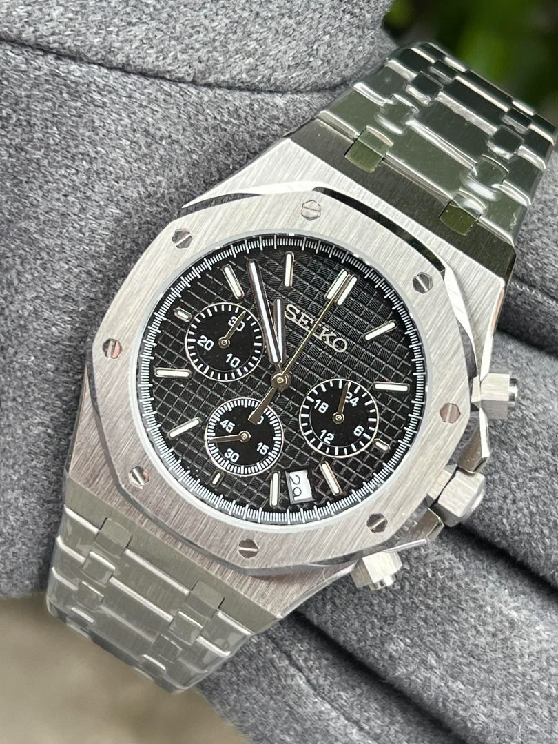 Seiko Mods (Royal Oak Chrono) (Category: Luxury Watches) located in Valenzuela. Submitted by jedmiguel (Listing ID 1390825723, Image 1). Description: Seiko Mods Royal Oak Chrono Black Silver Black Green Blue Silver For only PHP 7000 Brandnew & Original • Complete links • Comes with box, paperbag & card ✅ can do shipping ✅ COD OR COP VIA LBC ✅ meetup near me PM for more details Valenzuela/South Caloocan Area DISCLAIMER: We are not affiliated, asso