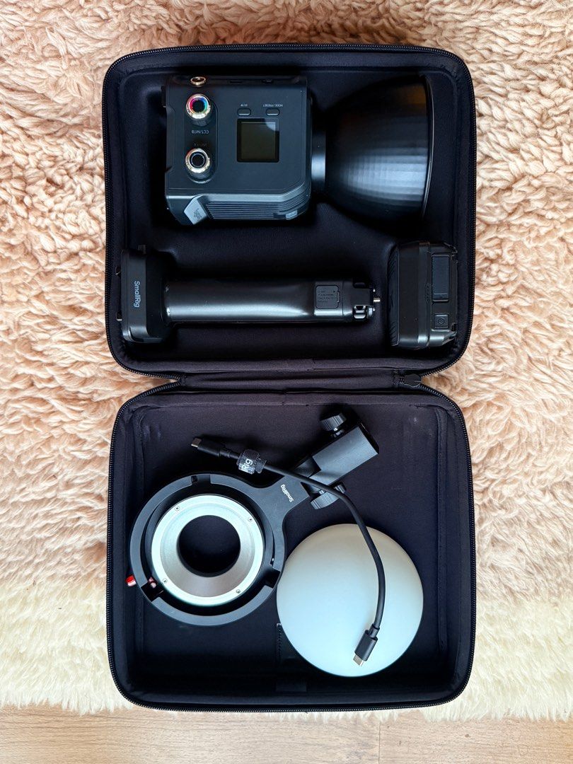 Smallrig RC 100C (Category: Lighting & Studio Equipment) located in Pasig City. Submitted by billtiyu (Listing ID 1390871156, Image 1). Description: Selling my preloved Smallrig 100c kit. Comes with everything except the box. Used it twice only but got my Aputure Storm 80c so letting this go. Inclusions: Light itself Bowens mount adapter Reflector Diffuser Grip V mount battery Usb-c cable Also for sale: RA-F150 Fresnel Lens.