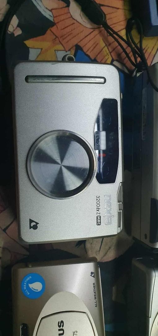 vintage camera as is (Category: Cameras) located in Calamba. Submitted by brian4027 (Listing ID 1390858012, Image 2). Description: all for 2500 1 digital working with CF card. AA batery 3 film camera working.