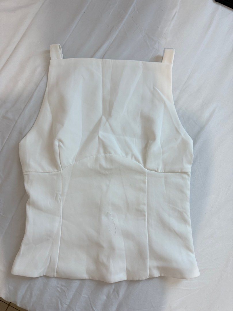 White Bow Top (Category: Blouses) located in Manila. Submitted by dalmideclutters (Listing ID 1390871544, Image 1). Description: -never used -too big on me -bought at ig: @clothesforbreakfast -flaw: check last pic.