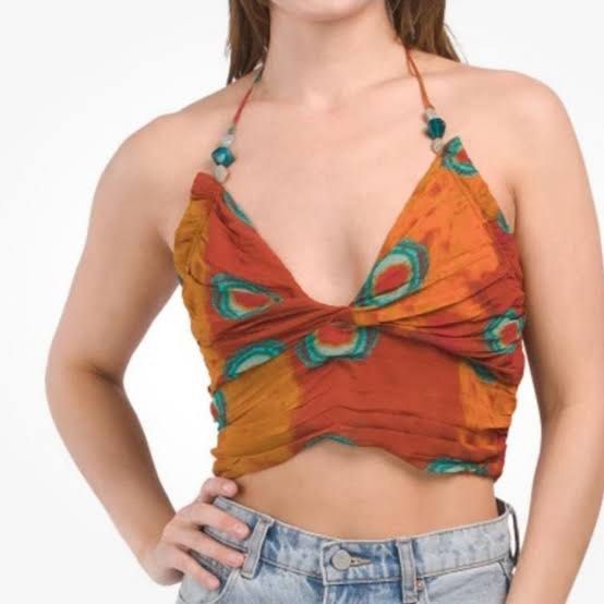 Zara Beaded Tie Back Printed Halter Crop Top (Category: Others Tops) located in Valenzuela. Submitted by under.wraps (Listing ID 1390924861, Image 3). Description: Size Medium Bohemian style with Earth tones printed fabric and tie back with beaded detailing. It has a v-neck , lightweight fabric and stretch side panels making it as comfortable as it is stylish. Approximately 16.5 flat lay pit to pit without the stretch. Orange multi colored.
