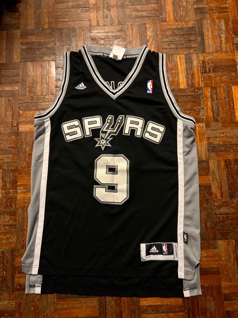 Adidas Tony Parker #9 Spurs Jersey - Size M (Category: Activewear) located in Singapore. Submitted by jerseyplugincorporated (Listing ID 1391059637, Image 1). Description: - Authentic Adidas NBA jersey - Features Tony Parker - Black and silver colorway - Size: M - Made in Vietnam - Good condition - Perfect for Spurs fans and basketball enthusiasts.