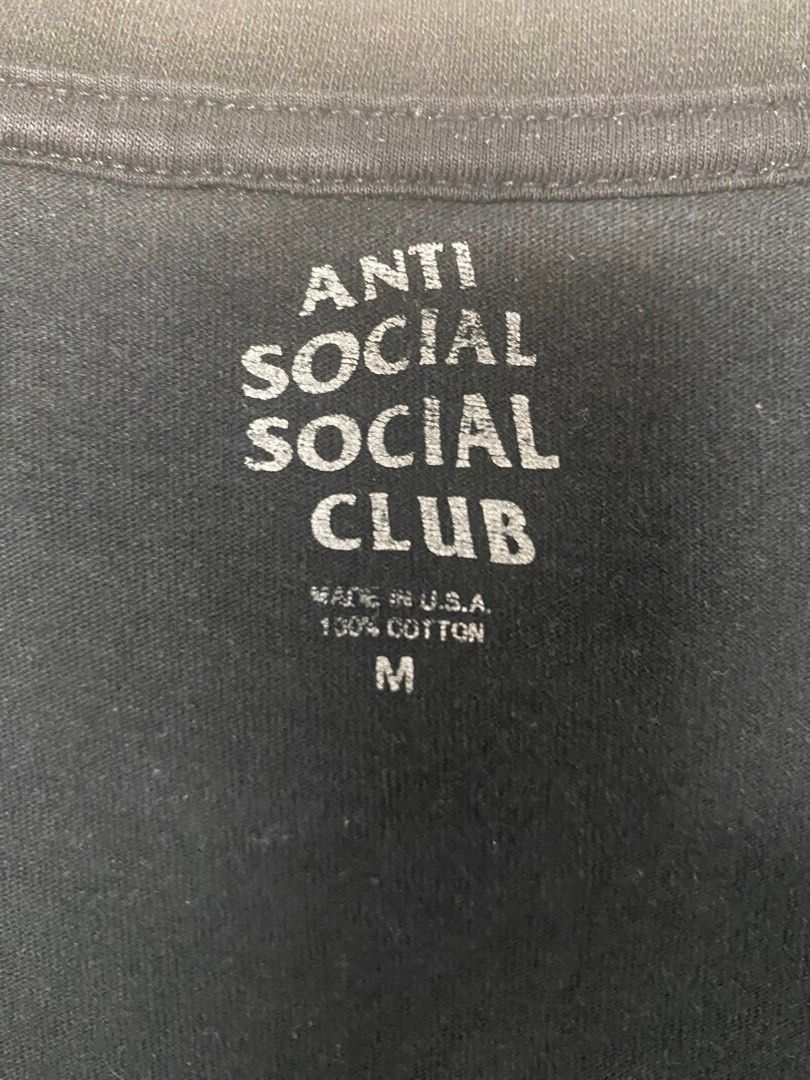 Anti Social Social Club T-Shirt | Graphic Print | Size M (W20 x L27) (Category: Luxury Apparel) located in Calamba. Submitted by r_r_v_ (Listing ID 1391097979, Image 3). Description: Anti Social Social Club Graphic Tee • Size: Medium (W20 x L27 inches) • Color: Black with Orange Print • Material: 100% Cotton • Front small logo print, large back print 📌 Please Read Before Buying: This is a pre-loved item. Minimal signs of wear may be present. Ite
