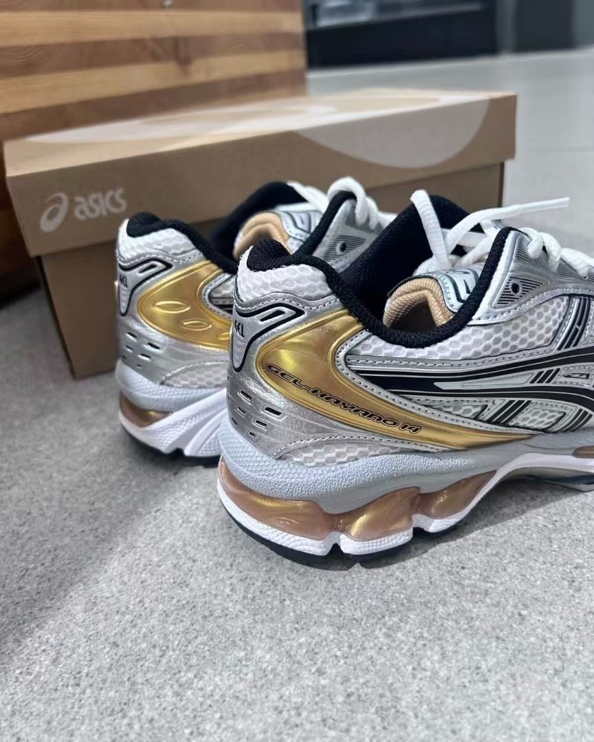 Asics Gel-Kayano 14 Silver/Gold Sneakers (Category: Sneakers) located in Singapore. Submitted by xpimincdxk67904 (Listing ID 1391055796, Image 3). Description: - Asics Gel-Kayano 14 sneakers - Silver and gold colorway - Mesh upper with metallic overlays - Comes with original box - Suitable for daily wear SIZE:EUR36-45.