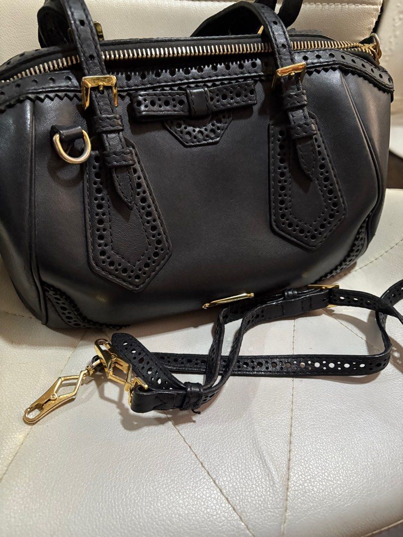Authentic Burberry Black Leather Bridle brogue Bag (Category: Luxury Bags & Wallets) located in Cavite. Submitted by cbmae (Listing ID 1389827784, Image 2). Description: very well used, minimal signs of use, with original strap.