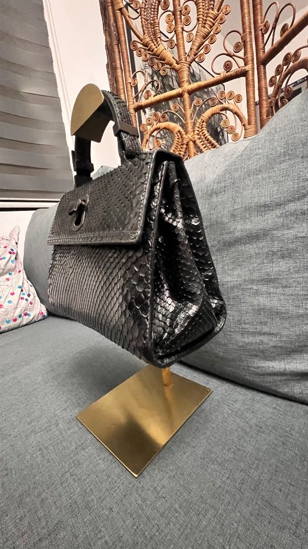 GIANFRANCO LOTTI Python Bag (Category: Purses & Pouches) located in Dagupan City. Submitted by pardonmyfrench2025 (Listing ID 1391096698, Image 3). Description: GIANFRANCO LOTTI Python bag Guaranteed Authentic Sold for $630 on Vestiare Lost the crossbody strap but has provision for one. Perfect for day or night events. *Actual photo/s posted. Additional photos for reference only. I do not claim the reposted photos as my own. Credit to the actual 