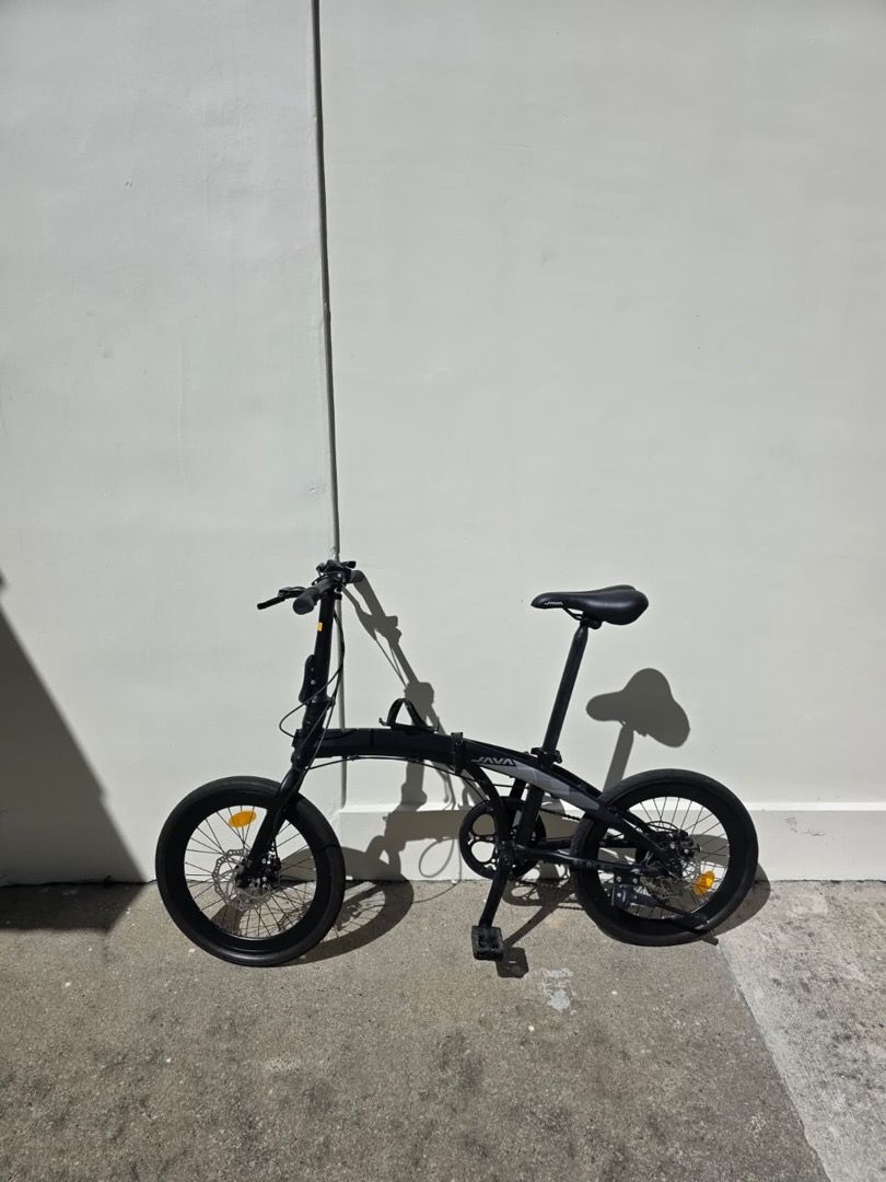 JAVA ZELO V2 FOLDING BIKE (Category: Bicycles) located in Singapore. Submitted by cycledome (Listing ID 1391055021, Image 4). Description: 🔧 JAVE ZELO V2 – Specifications -Frame: Lightweight alloy folding frame – compact, sturdy, and easy to carry -Fork: Steel rigid fork for durability and smooth city riding -Drivetrain: Shimano 7-speed – versatile gearing for urban commutes and light climbs -Brakes: Front & rear V-brakes – reliable stopping pow
