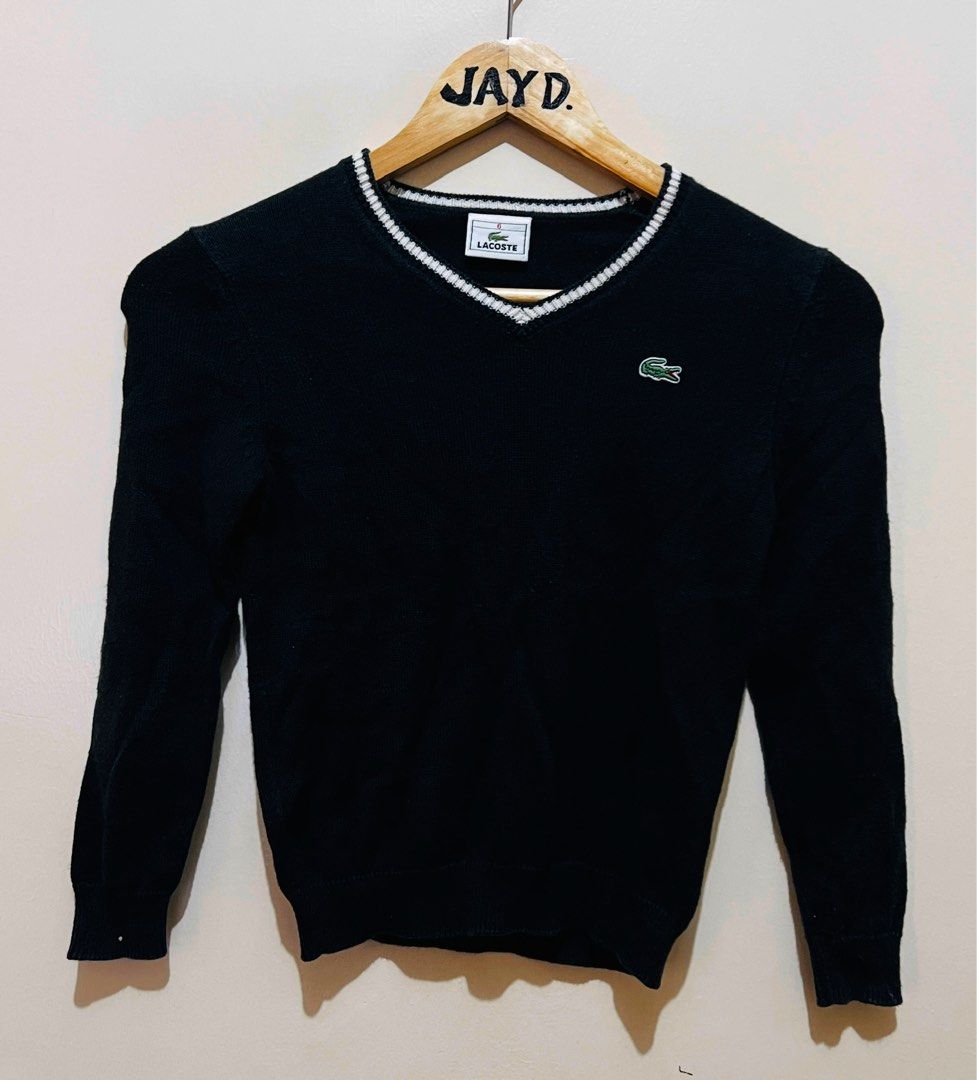 Lacoste knit sweater (Category: Babies & Kids Fashion) located in Quezon City. Submitted by deviljin17 (Listing ID 1390993345, Image 1). Description: Lacoste knit sweater Size 6 on tag 15” x 22”.