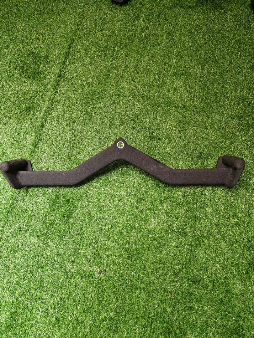 Lat Pulldown Bar (Category: Cardio & Fitness Machines) located in Singapore. Submitted by Arnold88 (Listing ID 1391126595, Image 1). Description: - Excellent condition lat pulldown bar. - Perfect for back exercises. - Features comfortable grips. - Sturdy and durable build. - Ready to elevate your workout..