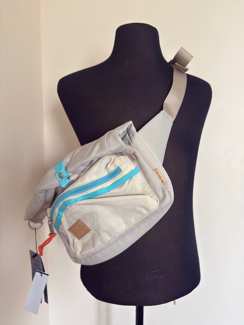 Outbound Active Slingbag (Category: Cross-body Bags) located in Makati City. Submitted by mikemabini (Listing ID 1391033454, Image 3). Description: Brand new and original multi-functional (sling/crossbody/bag) - one large compartment - removable strap - pocket for crossbody strap - back pocket - key holder - Gear loop - Cord zipper puller Dimensions: 29.5 cm x 7.5 cm x 31 cm Weight: .42kg Volume: 7L Materials: 420 Denier Twill Polyester origina p