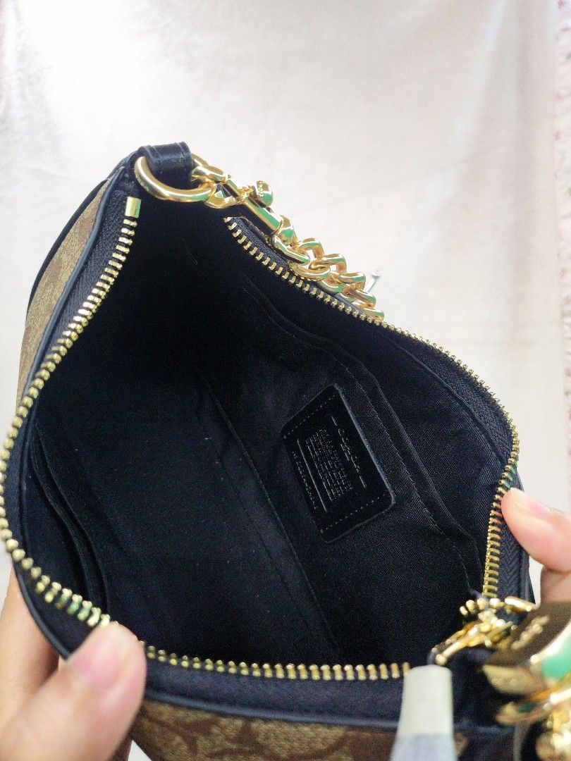 TERI MONO BLACK (Category: Luxury Bags & Wallets) located in Manila. Submitted by bagsbyblaironline1224 (Listing ID 1390997685, Image 2). Description: 🖤 👜 CCH Teri in Mono Black 👜🖤 Chic, versatile, and ready for everyday wear — the Teri Mono Black is a timeless piece that blends luxury with function 👌✨ ✔️ Classic black with monogram detail – goes with everything ✔️ Spacious interior + zip closure for security ✔️ Comfortable shoulder strap ✔️