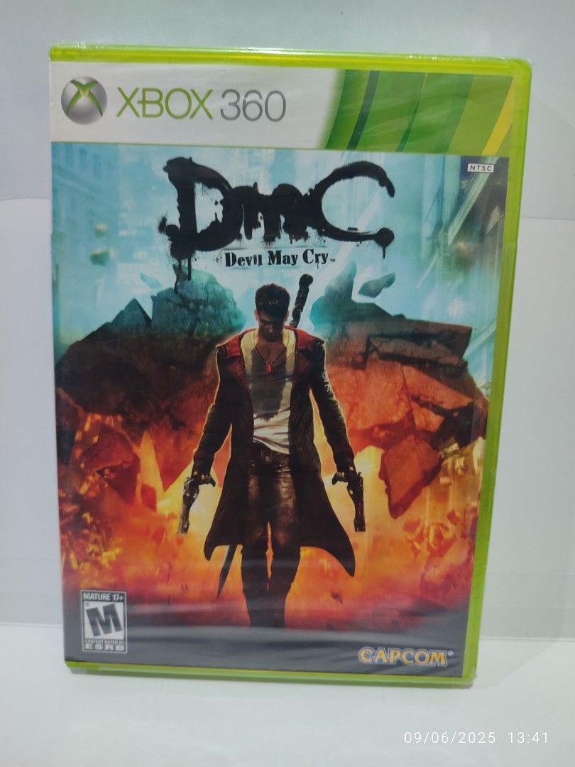 XBOX 360 - DMC Devil May Cry (BRAND NEW) "OPEN REGION" (Category: Xbox) located in Mendez-Nunez. Submitted by sf2_gameshop (Listing ID 1391016068, Image 1). Description: PLEASE READ: OPEN REGION - Works on ALL Xbox 360 units regardless of its region. CONDITION: Brand new, sealed (Y-fold) and the sticker seal is intact. Though it has a few tears in its plastic wrap (see photos). GENRE: Action-adventure, hack and slash MODE: Single-player REGION: N