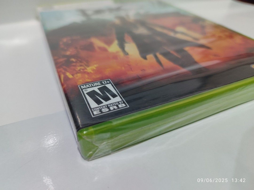 XBOX 360 - DMC Devil May Cry (BRAND NEW) "OPEN REGION" (Category: Xbox) located in Mendez-Nunez. Submitted by sf2_gameshop (Listing ID 1391016068, Image 3). Description: PLEASE READ: OPEN REGION - Works on ALL Xbox 360 units regardless of its region. CONDITION: Brand new, sealed (Y-fold) and the sticker seal is intact. Though it has a few tears in its plastic wrap (see photos). GENRE: Action-adventure, hack and slash MODE: Single-player REGION: N