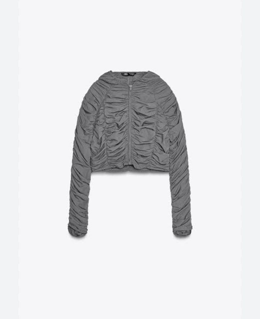 Zara Grey Ruched Windbreaker/Raincoat (Category: Activewear) located in Mandaluyong City. Submitted by secondhandbyk (Listing ID 1391063435, Image 1). Description: Worn once Feel super cute and cool when wearing this! Best for running, walking, or hiking on a chilly/rainy day. Could also be worn at malls, etc. :) Shipping from Mandaluyong or meet up at California Garden Square.