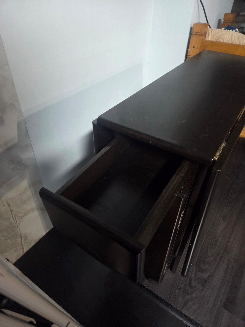 Breakfast Table (Category: Tables & Sets) located in Singapore. Submitted by Sha21_ (Listing ID 1391190846, Image 3). Description: - Dark wood cabinet - Although used, only used for keeping plastic bags. Good condition - Suitable for storage use - 1 drawer slide & 1 open door - No wear and tear present - Rarely used. -Foldable on both side -Original price 500$.