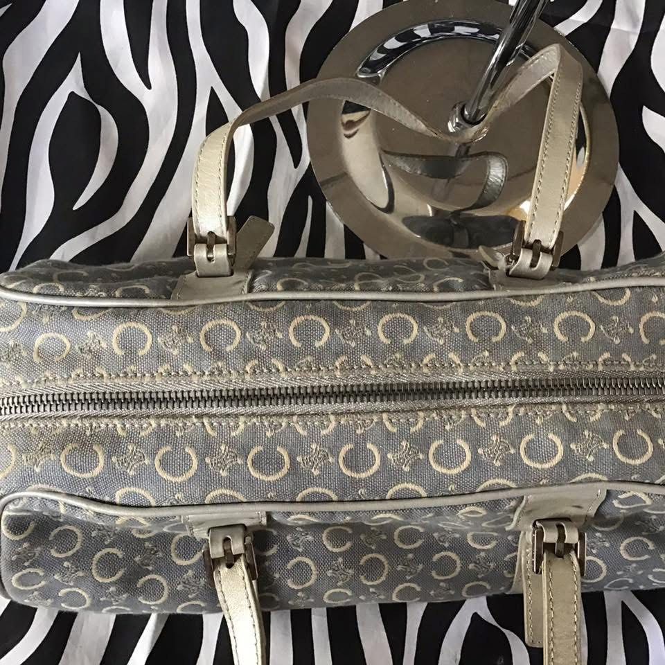 Celine (Category: Luxury Bags & Wallets) located in Mercedes. Submitted by ddshoping238309 (Listing ID 1391252309, Image 3). Description: Vintage Celine Boston Light blue Normal signs of use Leather handle has crack Message for more details.