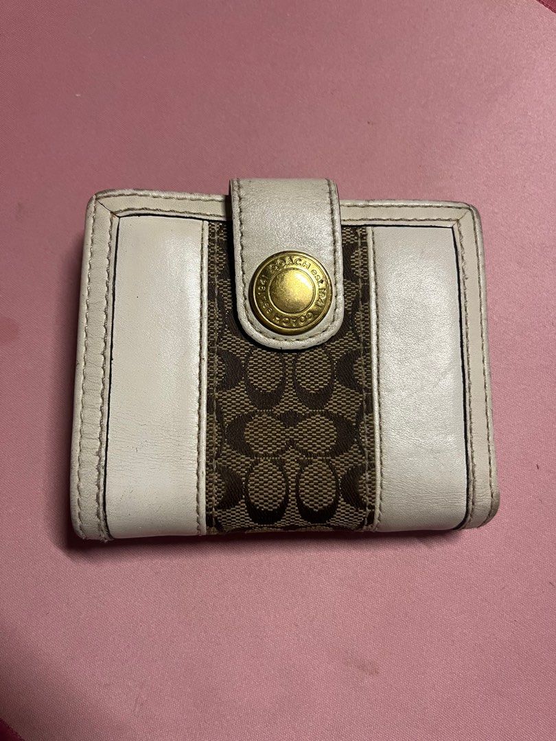 Coach Creme Pebble Wallet (Category: Luxury Bags & Wallets) located in Davao. Submitted by kanto-10 (Listing ID 1391215129, Image 1). Description: Selling my vintage authentic coach wallet - with coin slot - 2 paper bill compartment - card slots - picture slot - no bakbak at all - discolorations only due to age (can be fixed by leather paint) - slightly nego Location: Davao city .