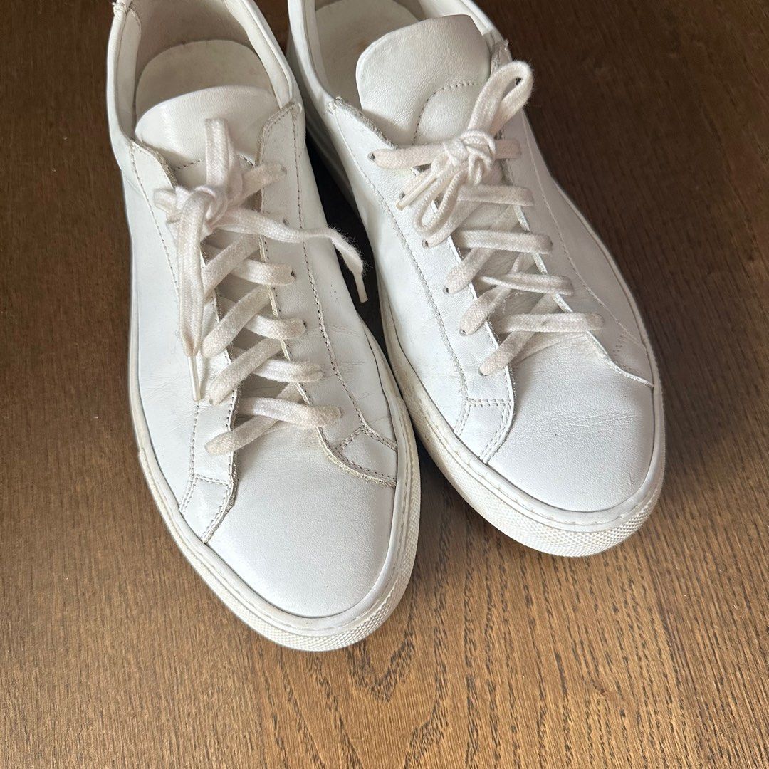 Common Projects Achilles Low Sneakers in White (Category: Sneakers) located in Makati City. Submitted by agl.ph (Listing ID 1391171419, Image 3). Description: Size 38 Fits true to size Currently retails for $400 Used a couple of times but in good condition! .