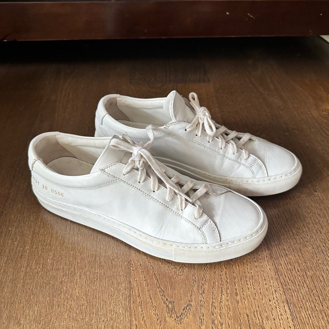 Common Projects Achilles Low Sneakers in White (Category: Sneakers) located in Makati City. Submitted by agl.ph (Listing ID 1391171419, Image 1). Description: Size 38 Fits true to size Currently retails for $400 Used a couple of times but in good condition! .