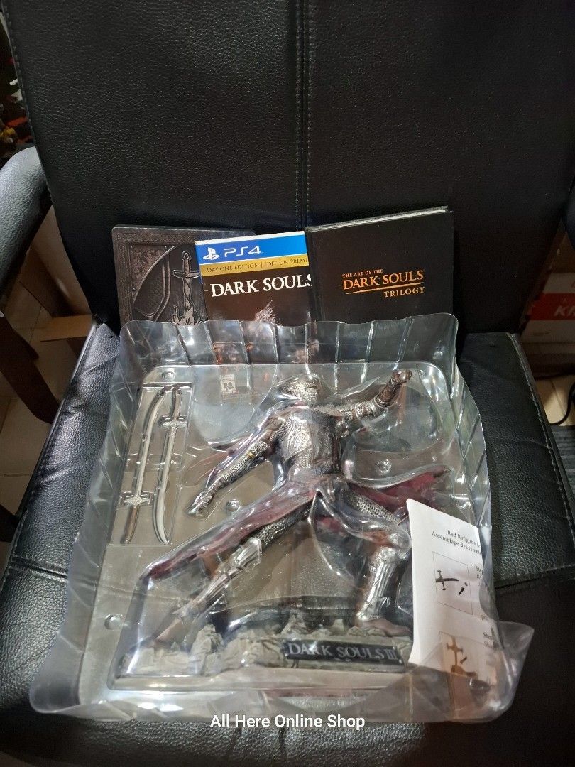 Dark Souls 3 Collector's Edition (Category: PlayStation) located in Las Pinas. Submitted by All.here_OnlineShop (Listing ID 1391264576, Image 3). Description: Dark Souls 3 Collector's Edition Included Items: Collector's Box: A custom-designed box to hold all the items. Red Knight Statue: A 10-inch, PVC figure of the Red Knight from the game. Hardcover Art Book: Contained art from all three Dark Souls games, not just Dark Souls 3. Metal Case: An e