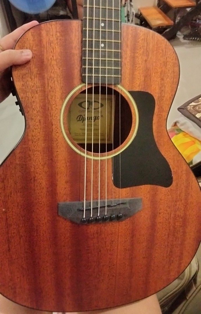 D&D Django Jr. Acoustic Guitar (Category: Musical Instruments) located in Quezon. Submitted by printing07 (Listing ID 1389931886, Image 2). Description: Never been used. Inclusions: - Wires (to connect to a speaker) - irig - Phone holder (good for recording) - Capo - Guitar bag - Picks - Strings To ship only, busy sa work no time for meet-up PM for interested buyer..
