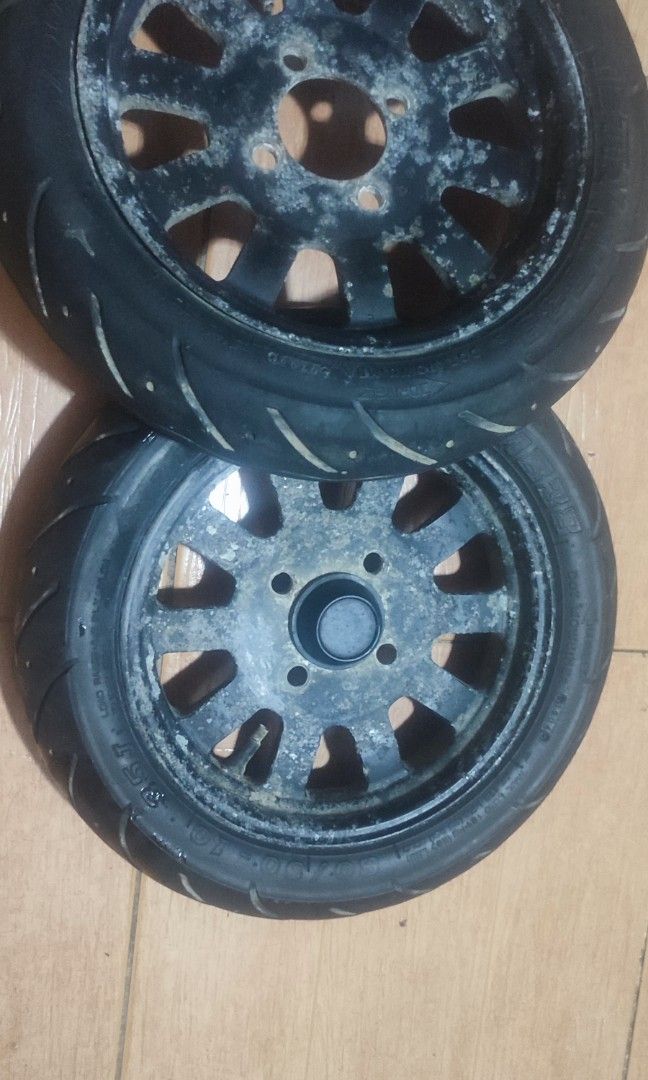 Ebike wheels (Category: Tires & Rims) located in Valenzuela. Submitted by oldbutgoods (Listing ID 1391177002, Image 2). Description: Nwow used wheels with rim 2pcs, makapal pa ang gulong size: 80/90/10 sama ko na yung front wheel para sa sure buyer update: repainted rim into white color.